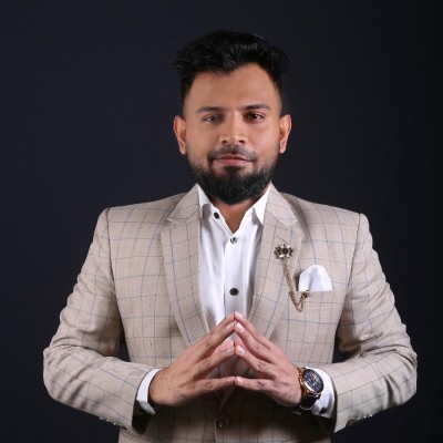 MD Asif Hossain in a checked suit